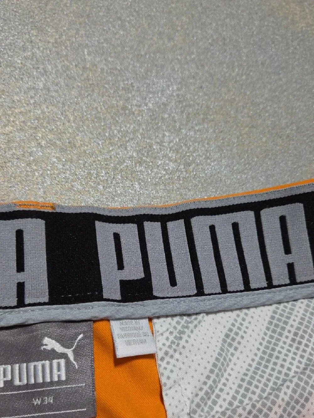 Puma Men's Flat-Front Shorts in Bright Orange